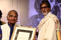 2 - Mr. Bachchan felicitates Mr. P.K.Nair at the Opening Ceremony